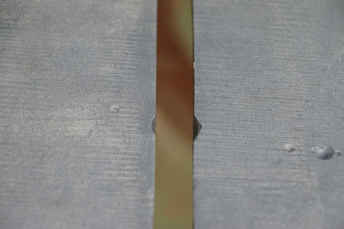 Metal surface after rust removal, project four